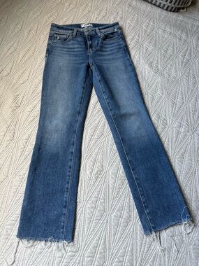 PAIGE Medium Blue Flared Jeans with Frayed Hem